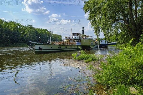 The historic paddle steamer KURORT RATHEN has docked at the steamer landing stage in Pillnitz, Dresden, Saxony, Germany, Europe