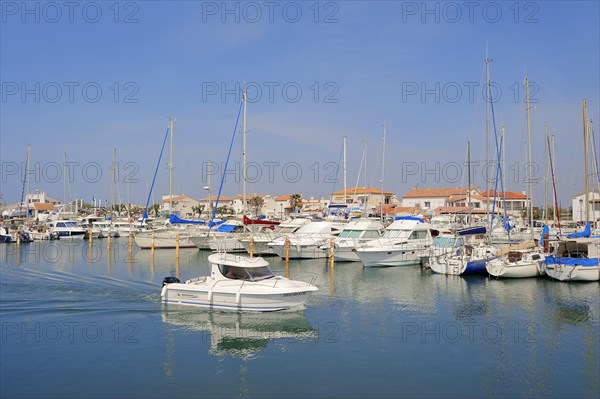 Boats in the harbour, Les Saintes-Maries-de-la-Mer, Camargue, Bouches-du-Rhone, Provence-Alpes-Cote d'Azur, South of France, France, Europe