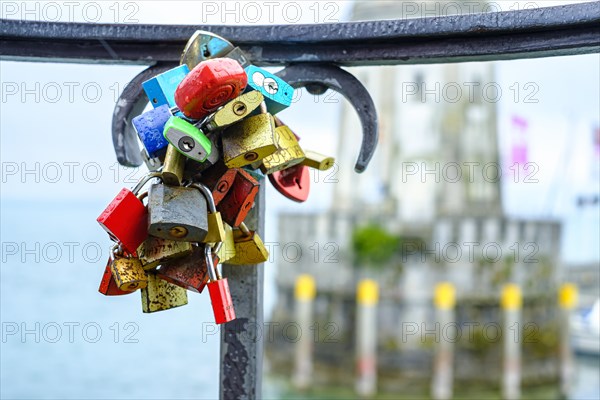 Symbolic image: Love locks on a railing, here in the harbour in the old town of Lindau (Lake Constance), Bavaria, Germany, Europe