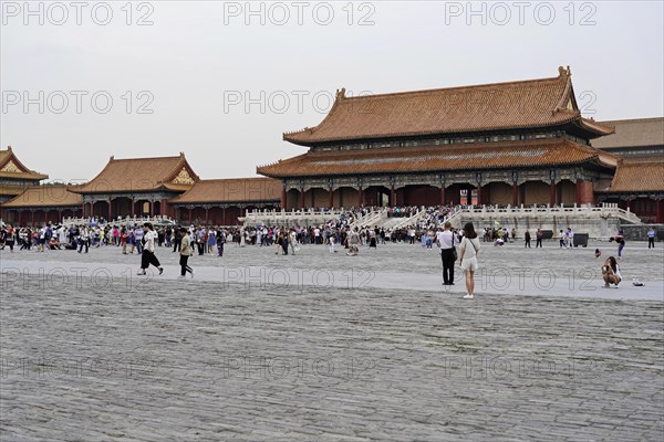 China, Beijing, Forbidden City, UNESCO World Heritage Site, Large crowds of people against the backdrop of the majestic buildings of the Forbidden City, Asia