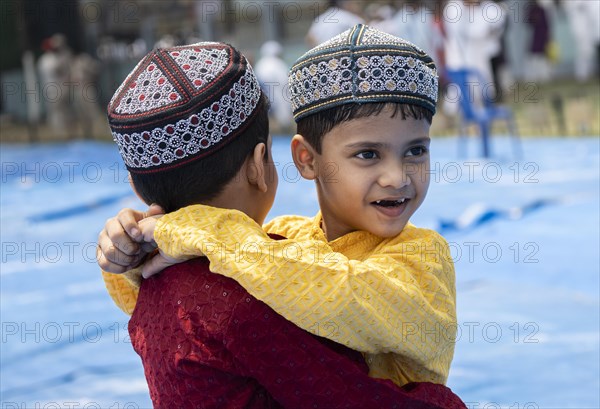 GUWAHATI, INDIA, APRIL 11: Muslim children greets each other after perform Eid al-Fitr prayer at Eidgah in Guwahati, India on April 11, 2024. Muslims around the world are celebrating the Eid al-Fitr holiday, which marks the end of the fasting month of Ramadan