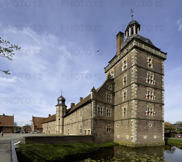 Perspective corrected photo View of in the foreground Sterndeuterturm stands in moat behind it outer bailey of moated castle Schloss Raesfeld, Freiheit Raesfeld, Muensterland, North Rhine-Westphalia, Germany, Europe