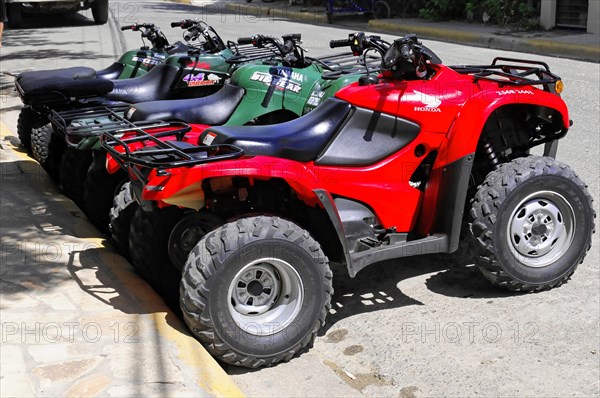 San Juan del Sur, Nicaragua, Several all-terrain vehicles parked in a row on the side of a road, Central America, Central America