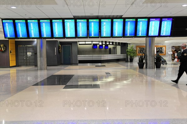 AUGUSTO C. SANDINO Airport, Managua, Nicaragua, A display board with flight information at an airport, Central America, Central America