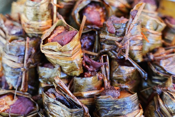 Excursion to Zhujiajiao Water Village, Shanghai, China, Asia, Traditional rolled sweets wrapped in cinnamon leaves, Asia