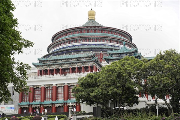 Chongqing City Hall, Chongqing, Chongqing Province, China, A large Chinese-style building with several floors and surrounded by trees under a cloudy sky, Chongqing, Chongqing, Chongqing Province, China, Asia