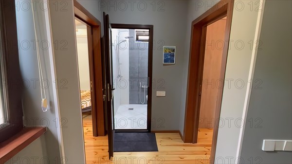 Entrance to a new house with a glass door. Nobody inside