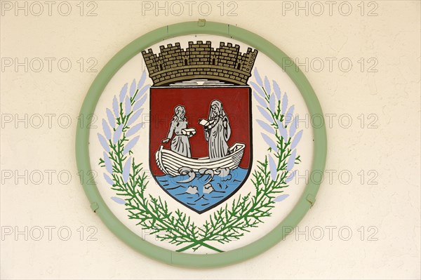 Coat of arms on the town hall, Les Saintes-Maries-de-la-Mer, Camargue, Bouches-du-Rhone, Provence-Alpes-Cote d'Azur, South of France, France, Europe