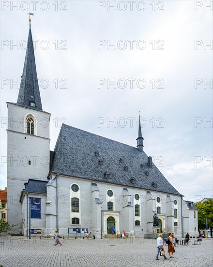 Everyday scene in front of the Herderkirche, actually the town church of St Peter and Paul, a UNESCO World Heritage Site since 1998, in the old town centre of Weimar, Thuringia, Germany, Europe