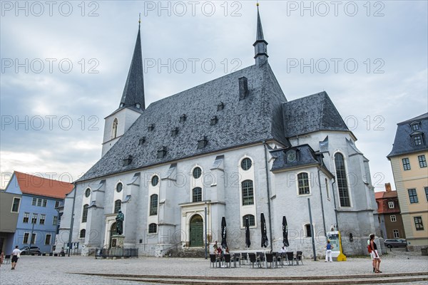 Everyday scene in front of the Herderkirche, actually the town church of St Peter and Paul, a UNESCO World Heritage Site since 1998, in the old town centre of Weimar, Thuringia, Germany, Europe