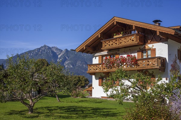 Residential house with garden and Lueftlmalerei, Garmisch district, Garmisch-Partenkirchen, Werdenfelser Land, Upper Bavaria, Bavaria, Germany, Europe