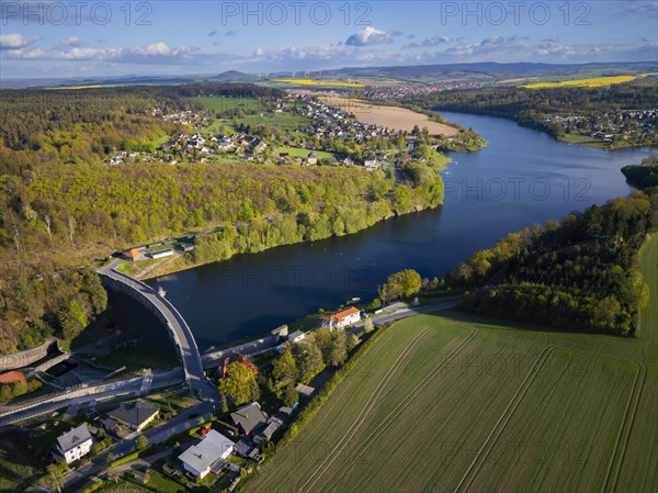 The Malter Dam is a dam built between 1908 and 1913 in the Free State of Saxony near the town of Malter, which impounds the middle reaches of the Rote Weisseritz. The dam is a curved gravity dam made of quarrystone masonry according to the Intze principle. The local road from Malter to Seifersdorf runs over the dam wall, Malter, Saxony, Germany, Europe