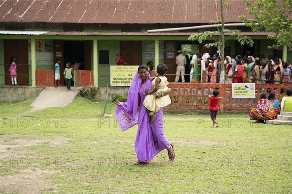 BOKAKHAT, INDIA, APRIL 19: Voter returns after cast vote during the first phase of the India's general elections on April 19, 2024 in Bokakhat, Assam, India. Nearly a billion Indians vote to elect a new government in six-week-long parliamentary polls starting today