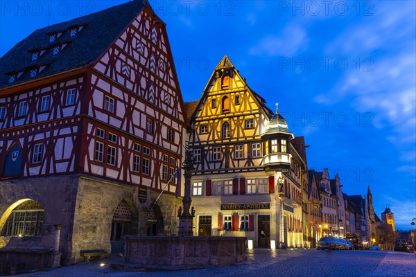 St George's Fountain in front of the Marienapotheke, Blue Hour, Rothenburg ob der Tauber, Middle Franconia, Bavaria, Germany, Europe