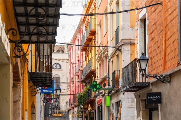 Narrow streets with shops in the city centre of Figueras, Spain, Europe