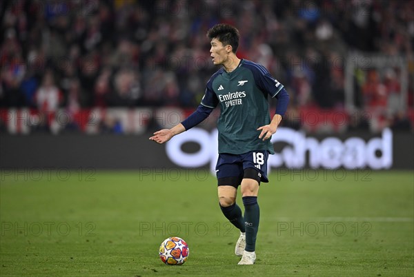 Takehiro Tomiyasu FC Arsenal (18) Action on the ball, Allianz Arena, Munich, Bavaria, Germany, Europe