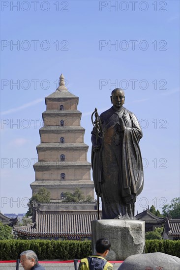 Great Wild Goose Pagoda, Pagoda, Yanta, Xian, Shaanxi, China, Asia, A statue in front of the historic Great Wild Goose Pagoda under a clear sky, Xian, Shaanxi Province, China, Asia