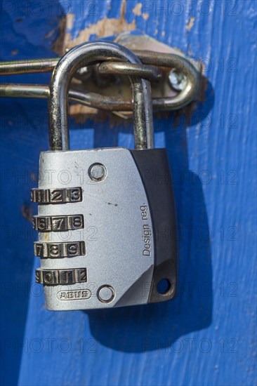 Padlock on a door bolt, Germany, Europe