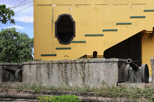 Granada, Nicaragua, The yellow facade of a building with baroque design elements and structures, Central America, Central America