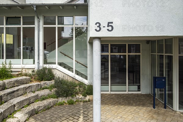 Maths problem 3-5 or house number depending on your point of view, combination of digits on modern architecture, used as a school building at the time the photo was taken, Wolfgangstrasse in Wangen im Allgaeu, Baden-Wuerttemberg, Germany, Europe