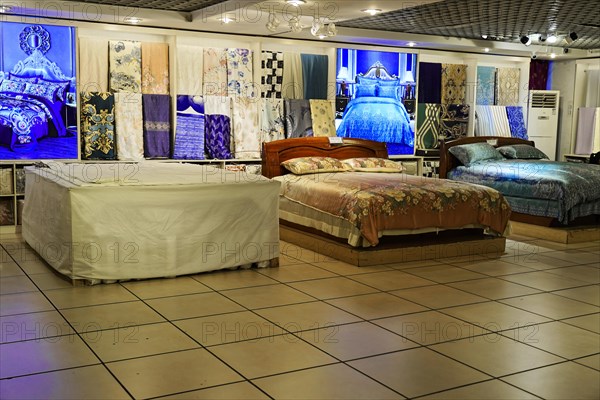 Silk Factory Shanghai, A bedroom exhibition with beds and colourful patterned bed linen, Shanghai, China, Asia