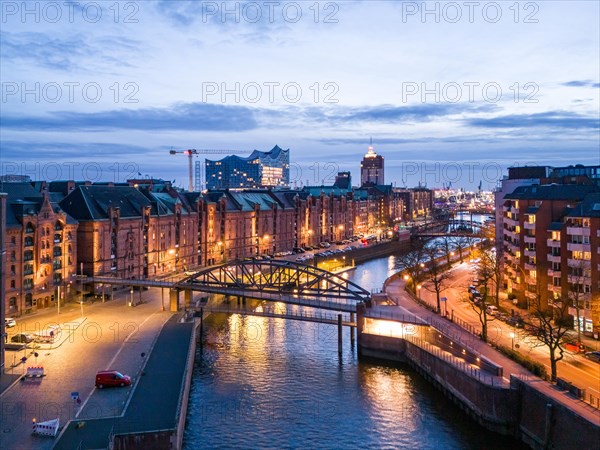 Aerial view of Speicherstadt Hamburg and the Elbe Philharmonic Hall with customs canal at blue hour, Hamburg, Germany, Europe
