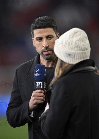 TV presenter Laura Wontorra DAZN, cap, interview with TV expert Sami Khedira, microphone, mike, logo, Allianz Arena, Munich, Bavaria, Germany, Europe