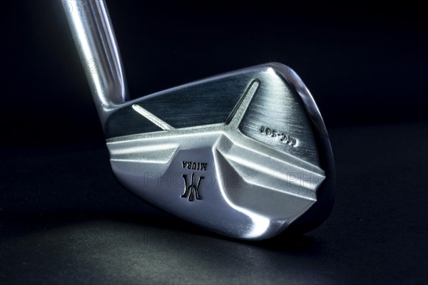 Golf Club Iron Miura MC 501 Illuminated on Black Background in Switzerland