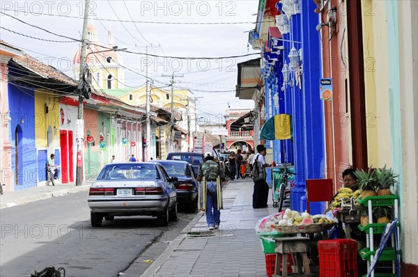 Granada, Nicaragua, View of a busy city street with colourful buildings and various roadside activities, Central America, Central America -, Central America