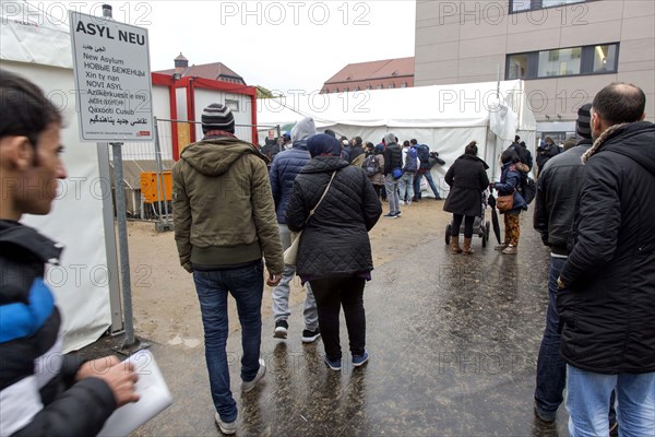 Syrian refugees wait for their registration in cold and wet weather at the Berlin State Office for Health and Social Affairs, 15 October 2015, Berlin, Berlin, Germany, Europe