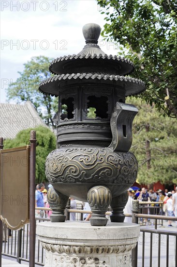 New Summer Palace, Beijing, China, Asia, An ornately engraved cauldron detail in the exterior of a cultural site, Beijing, Asia