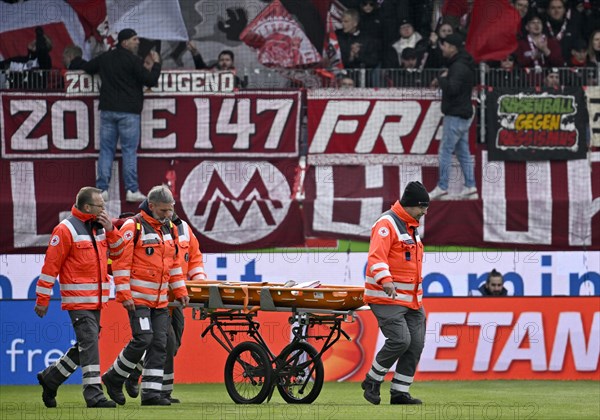 Injury, paramedic, Deurtsches Rotes Kreuz with mobile stretcher on the pitch, Voith Arena, Heidenheim, Baden-Wuerttemberg, Germany, Europe