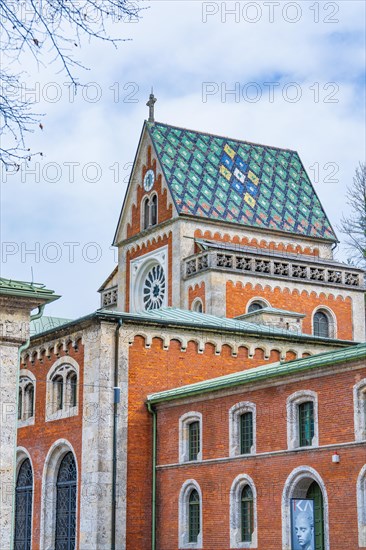 Historic building with strikingly patterned tiled roof and tower, Alte saltworks, Bad Reichenhall, Bavaria, Germany, Europe