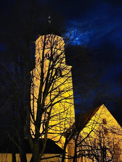 St Martin's Church in Illertissen by night and moonlight. Illertissen, Swabia, Bavaria, Germany, Europe