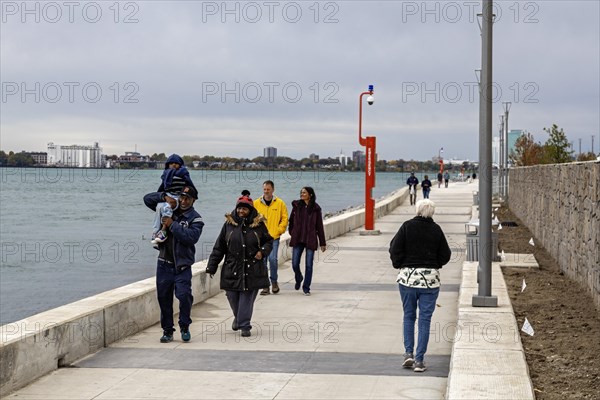 Detroit, Michigan, People walking on the Detroit Riverwalk, on the site of the old Uniroyal tire plant