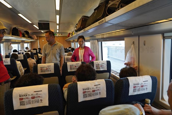 Express train CRH380 to Yichang, passengers in the interior of a train with luggage rack above the seats, Shanghai, Yichang, Yichang, Hubei Province, China, Asia
