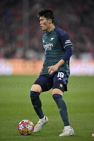 Takehiro Tomiyasu FC Arsenal (18) Action on the ball, Allianz Arena, Munich, Bavaria, Germany, Europe