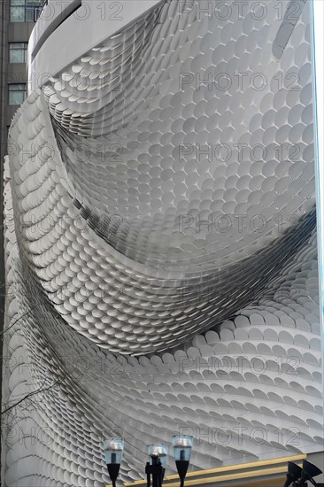Stroll in Chongqing, Chongqing Province, China, Asia, The facade of a modern building with circular patterns creates a dynamic look, Chongqing, Asia