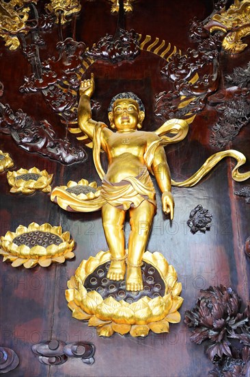 Chongqing, Chongqing Province, China, Asia, Golden mythical figure as a detail of an ornate Chinese decoration, Asia