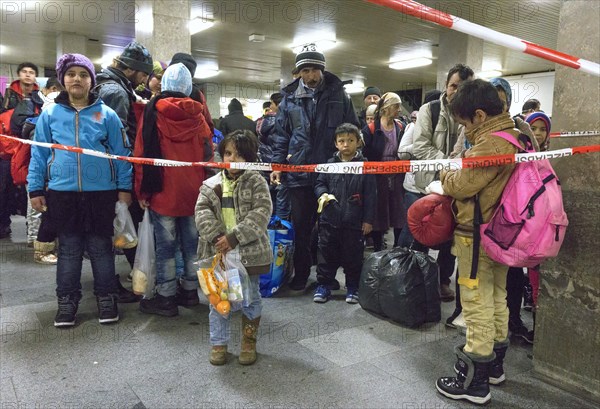 Refugees have arrived at Schoenefeld station on an IC train. They are then taken by bus to accommodation in Berlin, 02.12.2015, Schoenefeld, Brandenburg, Germany, Europe