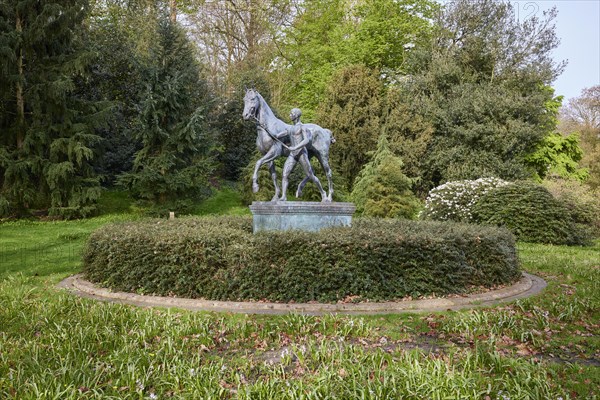Sculpture Der Rosselenker by the sculptor Louis Tuaillon in the Wallanlagen park in Bremen, Hanseatic city, federal state of Bremen, Germany, Europe