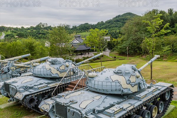 Closeup of military tanks with camouflage paint on display in public park in Nonsan, South Korea, Asia