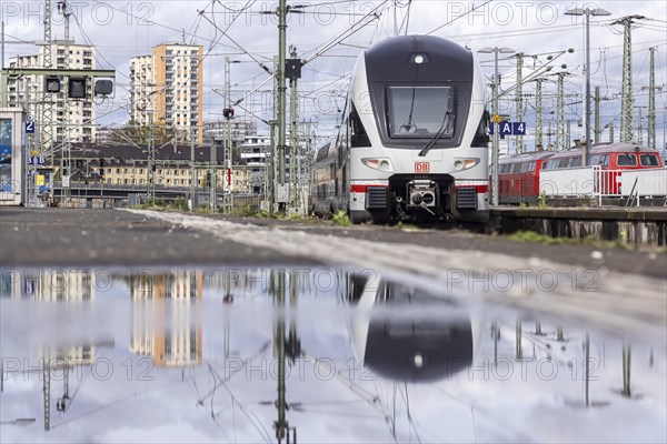 Stuttgart main station with track apron and arriving and departing trains. InterCity, Stadler KISS double-decker multiple-unit train, Stuttgart, Baden-Wuerttemberg, Germany, Europe