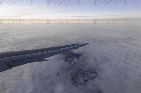 Flight to Stuttgart, Germany, Early morning view through aeroplane window of wings and cloud cover, AUGUSTO C. SANDINO Airport, Managua, Nicaragua, Central America, Central America