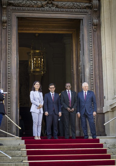 Annalena Baerbock (Alliance 90/The Greens), Federal Foreign Minister, takes a photo during her participation in the international humanitarian conference on Sudan and its neighbouring countries. Here with Stephane Sejourne (2nd from left), Foreign Minister of France, Josep Borrell (R), High Representative of the EU for Foreign Affairs and Security Policy, and the Foreign Minister of South Sudan, James Pitia Morgan. 'Photographed on behalf of the Federal Foreign Office'