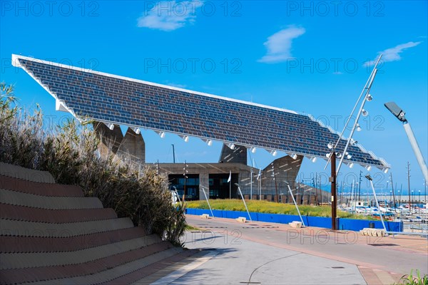 The photovoltaic pergola in the Forum district, a sail the size of a football pitch made of solar panels in the harbour on the beach in Barcelona, Spain, Europe