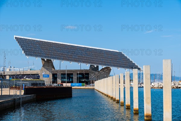 The photovoltaic pergola in the Forum district, a sail the size of a football pitch made of solar panels in the harbour on the beach in Barcelona, Spain, Europe