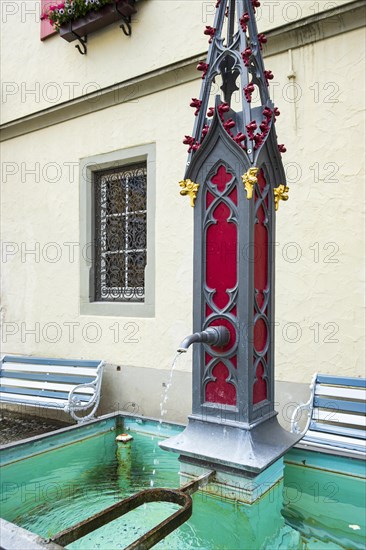 Historic fountain in neo-Gothic style on Postplatz in the old town centre of Wangen im Allgaeu, Upper Swabia, Baden-Wuerttemberg, Germany, Europe