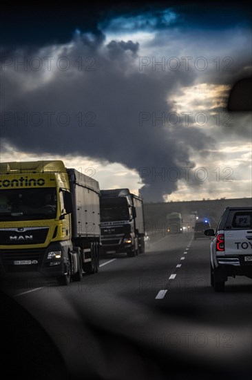 The Federal Minister for Economic Affairs and Climate Protection Robert Habeck (Alliance 90/The Greens) is visiting Poland, Ukraine and the Republic of Moldova from 17.04-19.04.2024. Odessa, 19.04.2024. Drive past the column of smoke in the port of Odessa, where there was a missile strike in the morning