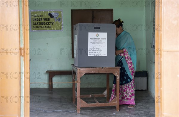 A women casts her vote during the first phase of the India's general elections on April 19, 2024 in Bokakhat, Assam, India. Nearly a billion Indians vote to elect a new government in six-week-long parliamentary polls starting today